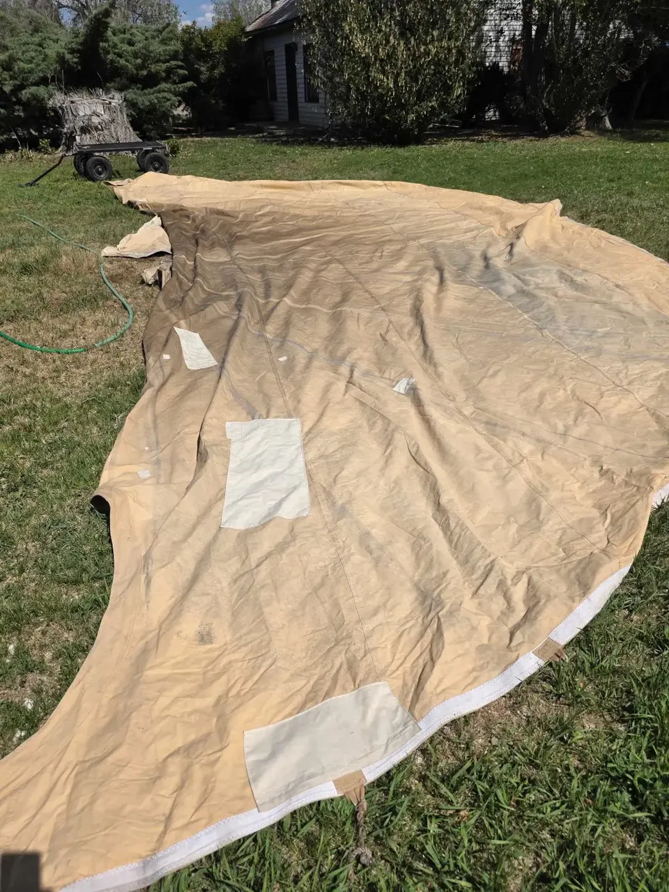 Before the repair: Canvas Tipi Repair — Multi-Tear Restoration