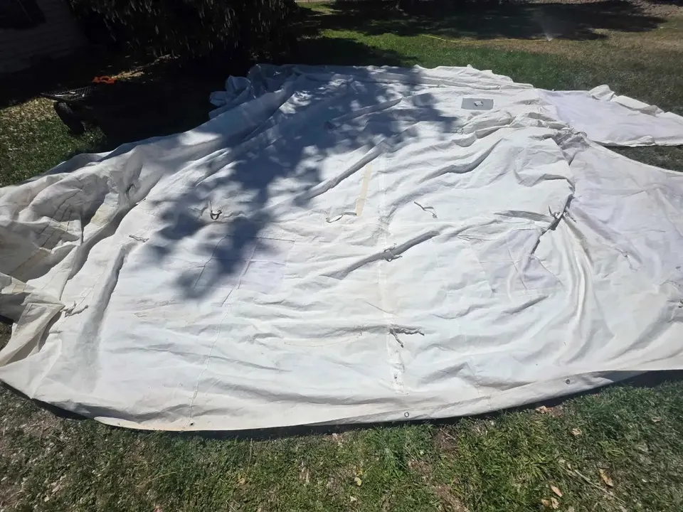 Before: Outfitter-Size Canvas Wall Tent Repair — Four-Tear Restoration (18'x20')